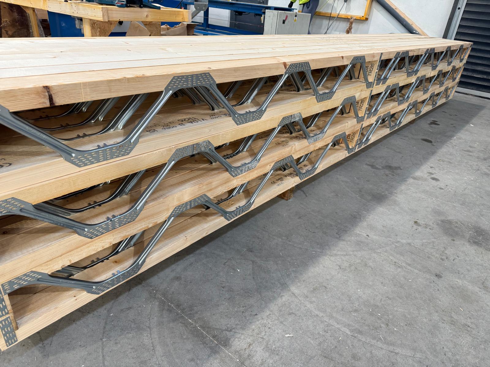 Stacked Posi-Joist open metal-web floor joists ready for delivery